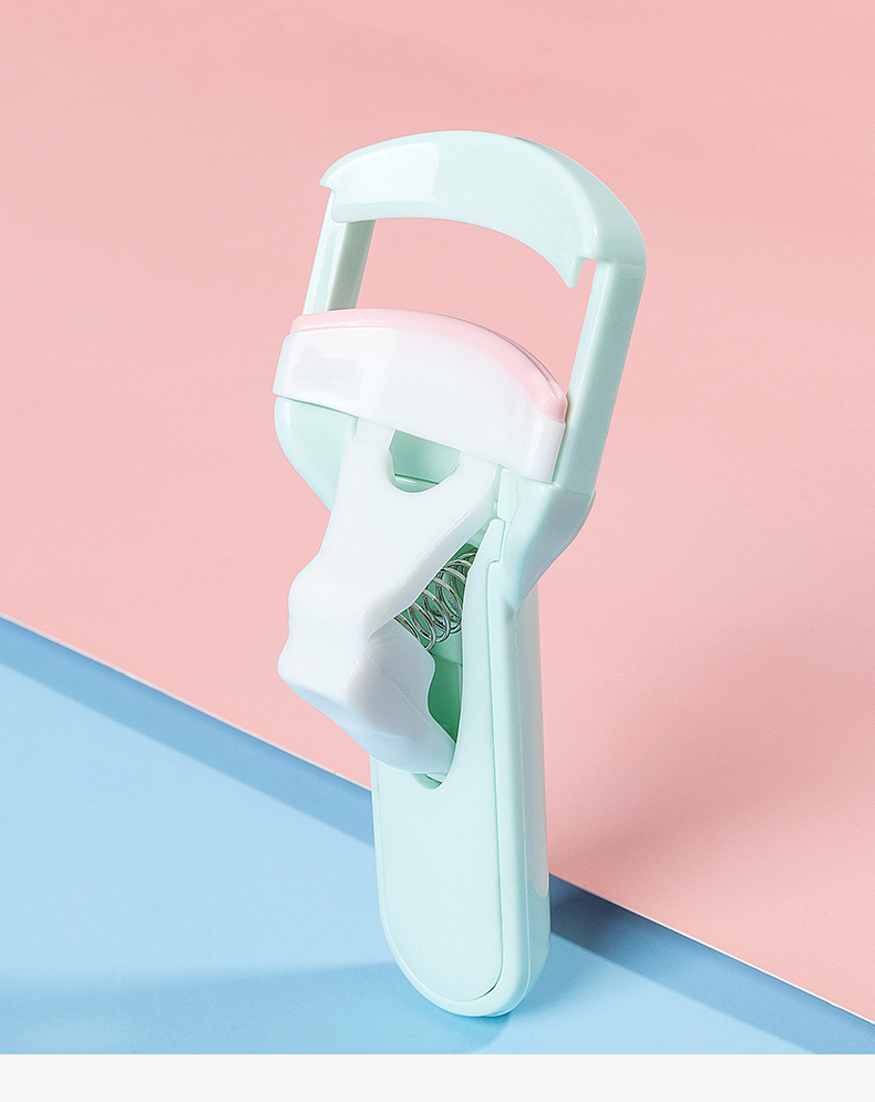 En stock fábrica al por mayor de plástico rizador de pestañas rizador de conformación portátil almohadilla de goma principiante prensa-tipo rizador de pestañas