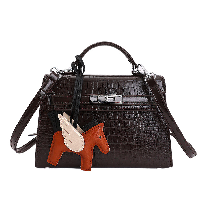 Nicho popular cocodrilo portátil bolso Kelly mujer 2026 nueva moda versátil alta sensación de hombro mochila
