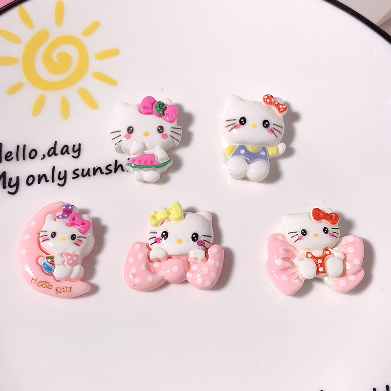Nuevos accesorios de resina de gato de dibujos animados KT pegamento de crema casero diy clips de pelo para niños botones de zapatos parches de belleza