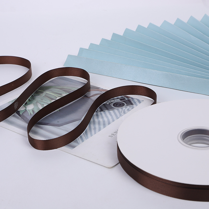 Suministro directo de fábrica cinta roscada cinta marrón caja de regalo embalaje bolso cinta accesorios de ropa cinta al por mayor