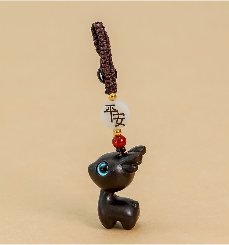 A deer car key chain pendant sandalwood deer buckle key car decoration deer couple pendant