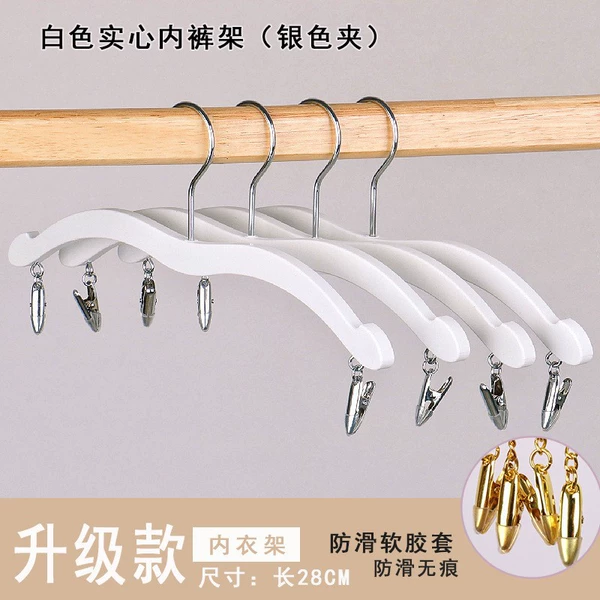 White trouser rack with silver hooks