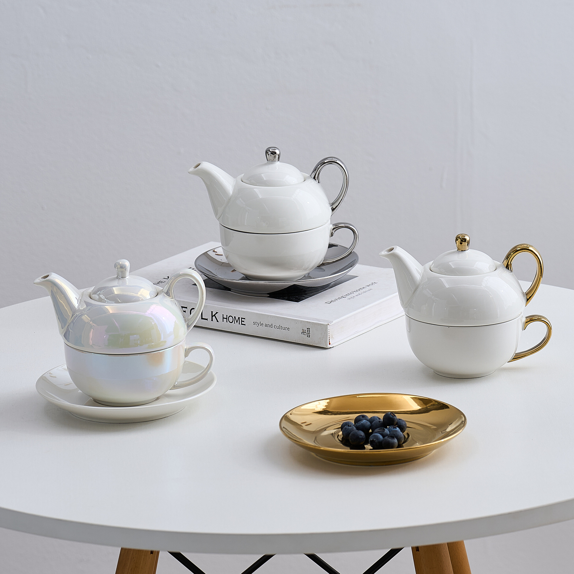 Tetera transfronteriza con logotipo, juego de té de cerámica, té de la tarde, taza de café, tetera, olla de lujo ligera