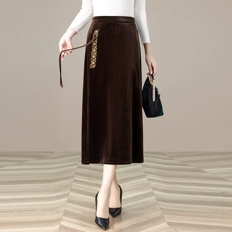 Золотые бархатные юбки женского пола 2024 осень и зима новый стиль с высокой талией бедра юбка среднего и длинного темперамента с открытым шагом юбка