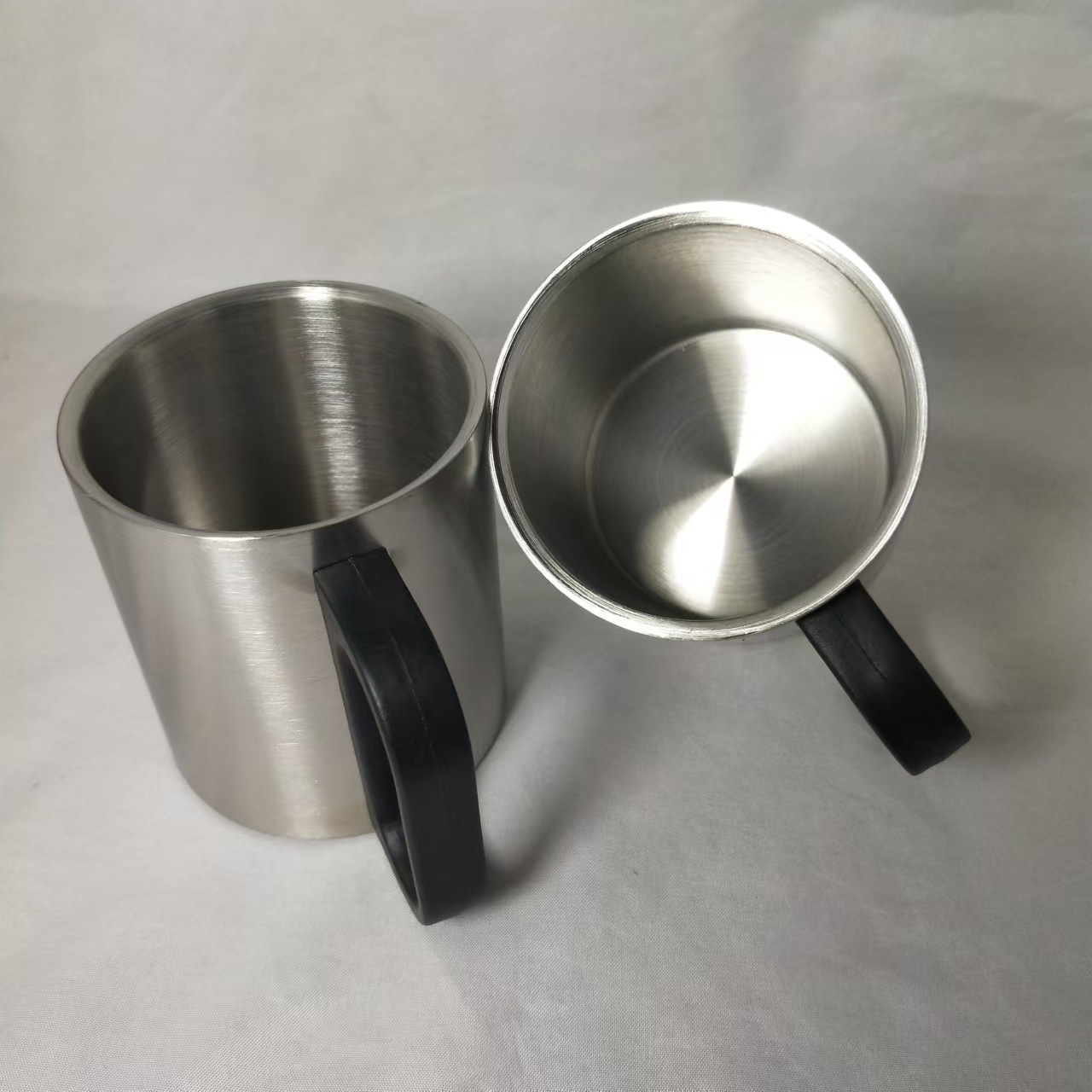 Nuevo termo de acero inoxidable de venta caliente con mango, taza de agua doméstica portátil, fabricante de tazas de oficina de negocios de moda