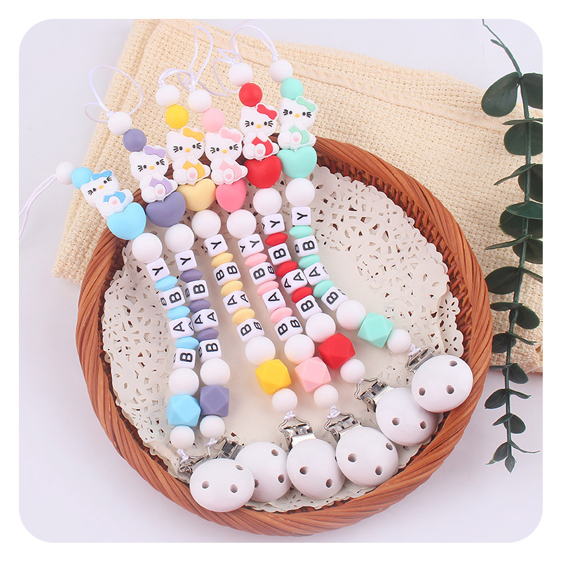 Bebé blanco tetina clips juguetes KT gatos silicona tetina cadena cadena de cadena Aliexpress Amazon explosión