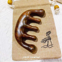 A pair of massage comb gifts with wood handle, engraved with text for hairdressing, beauty salons, therapy clinics, TCM clinics, and Gua Sha.