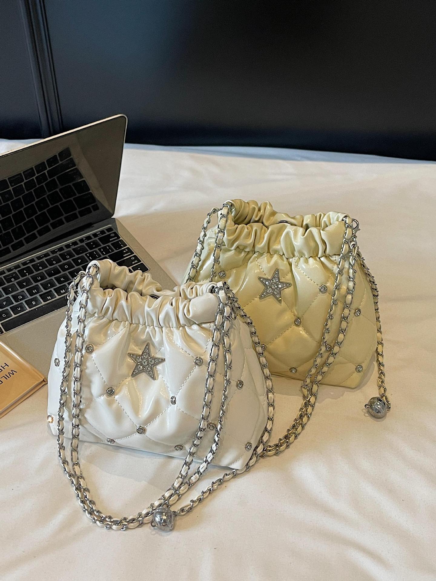 Bolso de cadena de rombos de fragancia pequeña transfronteriza para mujer 2025 nuevo estilo estilo occidental bolso de hombro de viajero salvaje bolso de cubo de mensajero