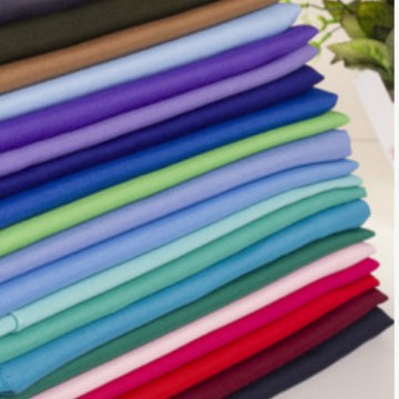 厂家直销漂白染色平纹呢罗尔尼梭织化纤面料户外迷彩服装面料