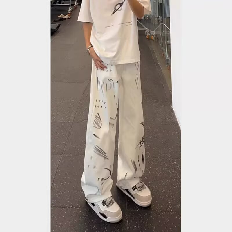 Black and White Dirty Graffiti Scimitar Jeans Men's Handsome Slim Pants American High Street Loose Straight Wide Leg Pants