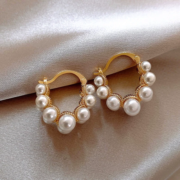 Golden earrings from pearl
