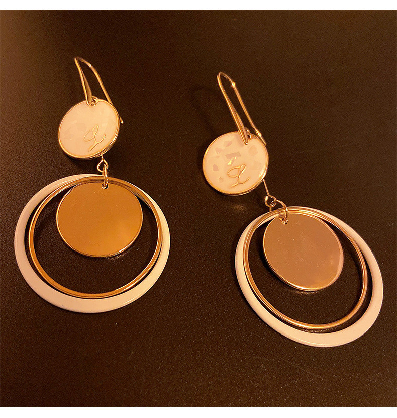Metal geometric circle hollow out long niche design, fashionable earrings, simple and high-end style earrings_voghion.com