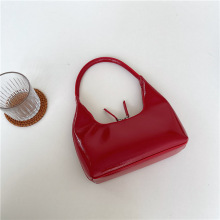 韩版春季PU小手提包女小众高级感手拎包时尚亮面凯旋门腋下包包女