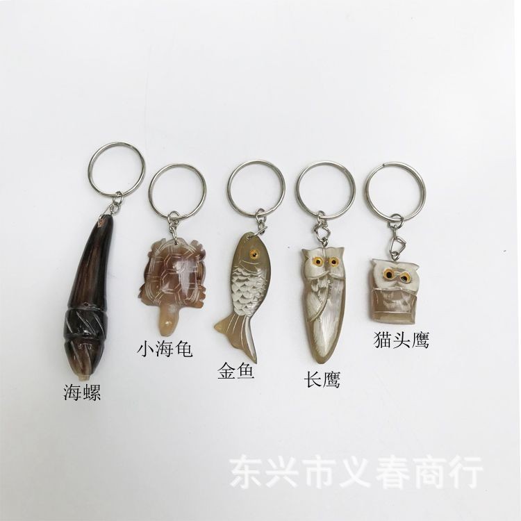 牛の角の丈夫で丈夫なキーホルダー車のロックは生肖の小動物の牛の角の製品の工芸品の車のアクセサリーを掛けます。|undefined