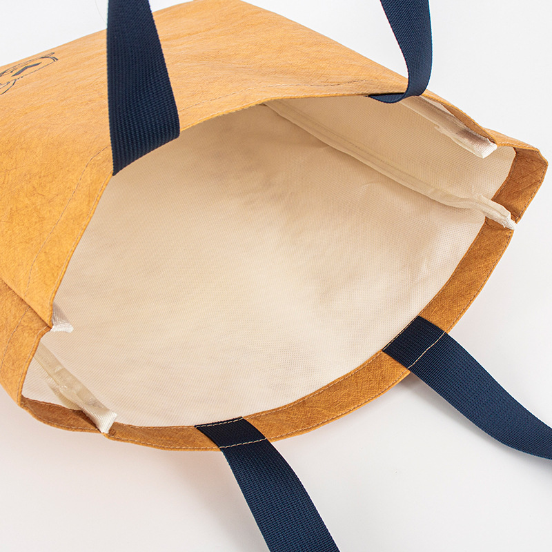 Bolsa de papel DuPont logotipo personalizado patrón de impresión Papel DuPont bolsa cultural y creativa bolsa de compras Bolsa de papel DuPont personalizada