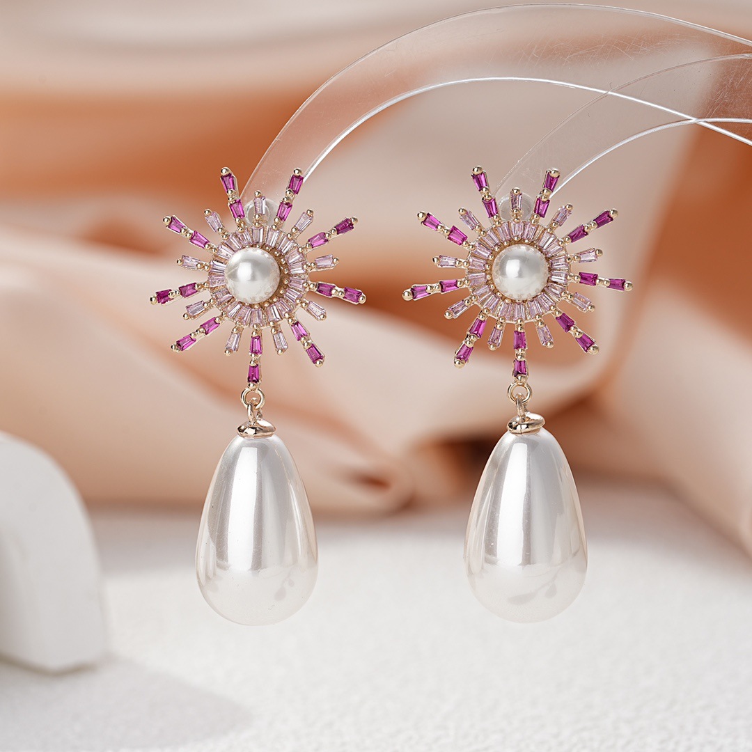 Fashionable elegant sophisticated earrings drop-shaped pearl…