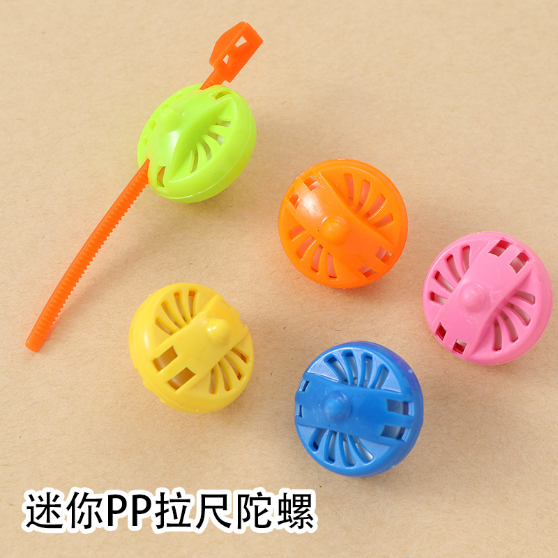 Mini tamaño pequeño tire gobernante giroscopio juguete para niños girando tire gobernante giroscopio juguete nuevo color caramelo tire gobernante giroscopio