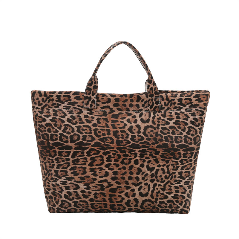 Europa y los Estados Unidos retro leopardo de gran capacidad 2025 nueva bolsa de mano de viento perezoso simple de moda de viaje elegante bolsa de mano