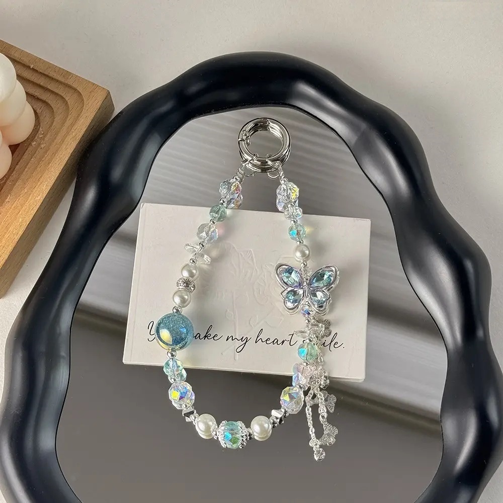 Nuevo estilo coreano de alta calidad perla circón bowknot cuentas de cristal cordón de teléfono móvil colgante de llavero de nailon Ruyi