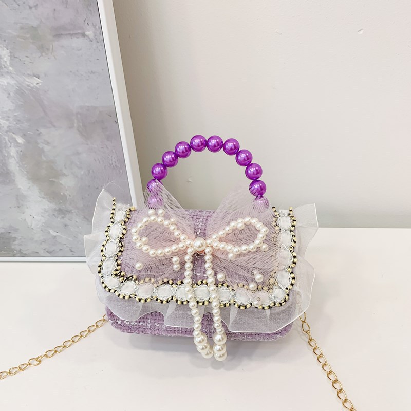 Niña tween pequeña bolsa de hombro arco encantadora princesa mochila de perlas de aire extranjero para niños bolsos lotes