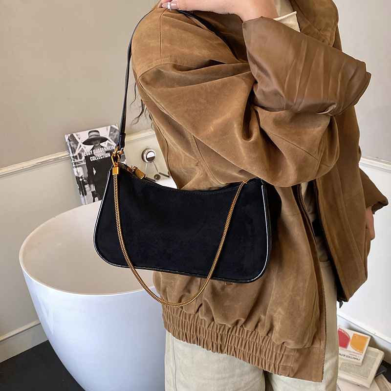 Corea del Sur de cuero de seda bolsos de mano bolsos de mano mujeres 2025 nueva moda cadena de hombro mochila bolsos de palo