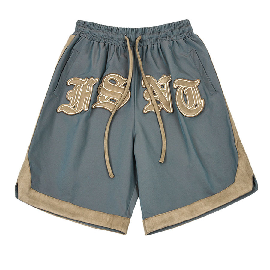 Marca de moda callejera europea y americana 2024 primavera y verano nuevo producto ligero camaleón contraste color bordado moda deportes casual pantalones cortos hombres