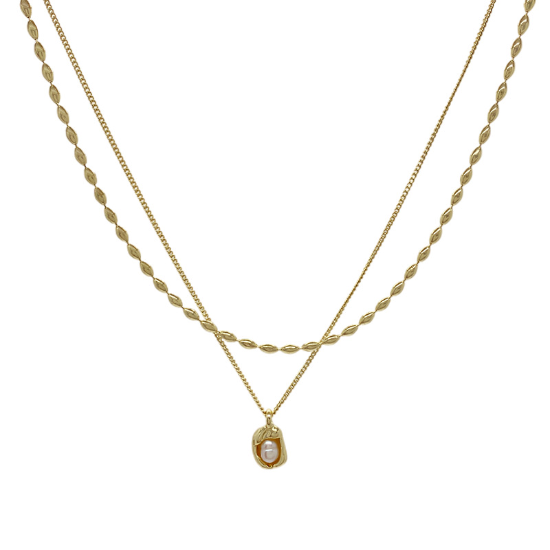 Collana stratificata minimalista con catene delicate gioiello_voghion.com