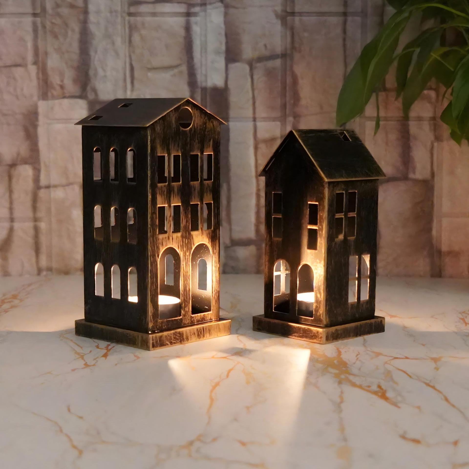 Nuevos productos transfronterizos europeos y estadounidenses hacen viejos castillos pequeños adornos candelables hierro forjado hueco casa navideña decoración de mesa candelables