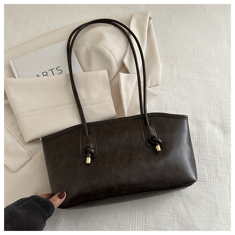 Commuting mujeres de color sólido 2024 nuevo otoño invierno retro moda texturas colgantes casuales de hombro bolso