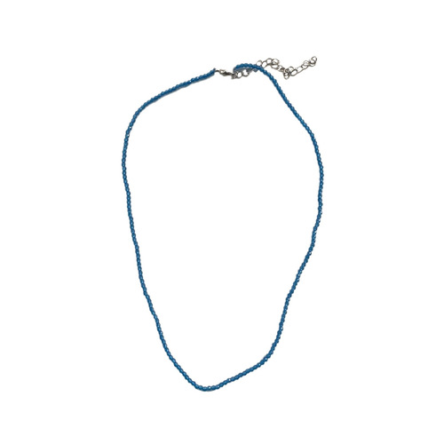 The blue bead necklace with a minimalist and niche design, exuding a sense of sophistication, similar to the one worn by Korean Instagram influencer Fever, for women.