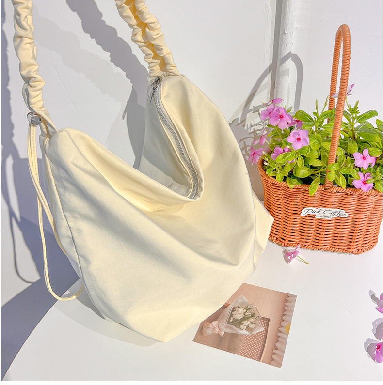 A new large-capacity women's single-shoulder bag with cross-border fashion and simplicity, a fresh and artistic crossbody bag, and a student commuting bag undefined