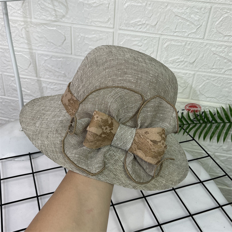 Sombrero femenino verano Lino moda sombrero de sol estilo occidental arco pescador sombrero casual protección solar sombrero de la madre sombrero retro cuenca