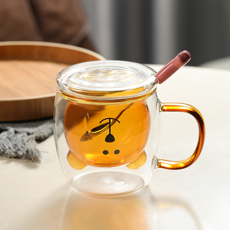 Oso amarillo con mango con tapa y cuchara