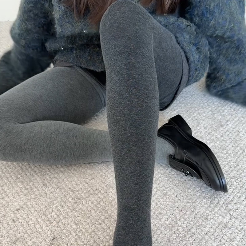 Pantyhose gris pálido para niños otoño y invierno con calentamiento grueso y calentamiento de presión de piernas delgadas.