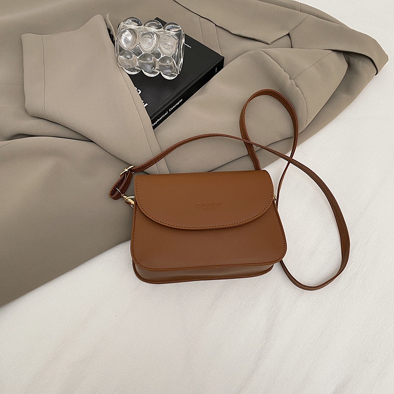 Bolso popular de este año 2024 nueva moda de verano, bolso de hombro universal de alto nivel, bolso de cinturón de color sólido