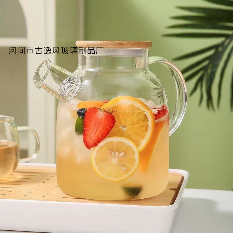 Tetera de vidrio gruesa resistente al calor Tetera pequeña resistente a altas temperaturas Tetera de flores con filtro de acero inoxidable Juego de té para el hogar