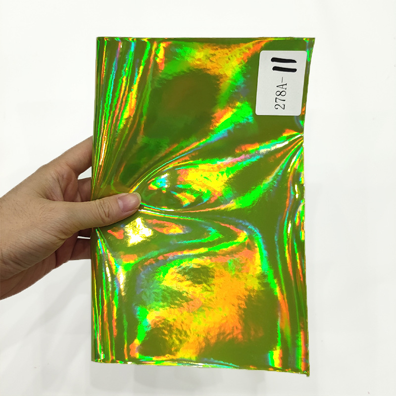 厂家直销幻彩镭射革镜面PU幻彩金属毛底PU人造革服装箱包手袋皮料