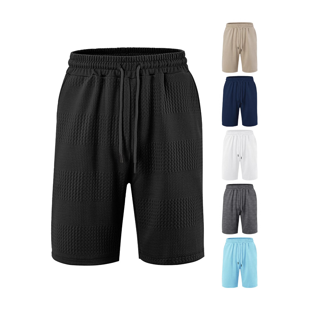 Fábrica europea de ropa de hombre transfronteriza en stock TK paleta suelta tela jacquard de banda larga de hombre pantalones cortos casuales de playa