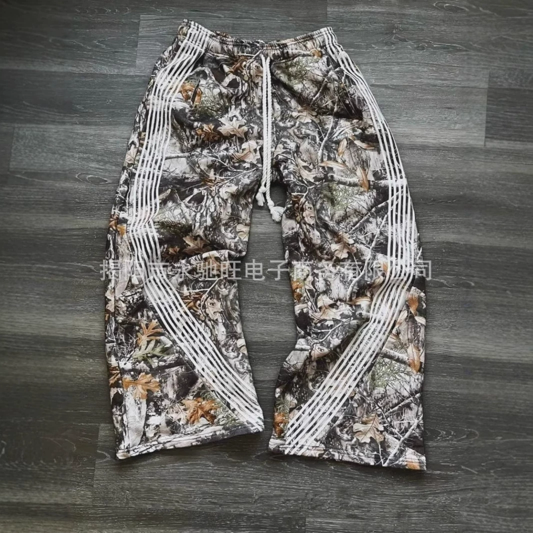 Свободные граффити повседневные длинные брюки для трансграничной торговли, камуфляжные функциональные карго-штаны в стиле американской уличной моды с эффектом потертости.