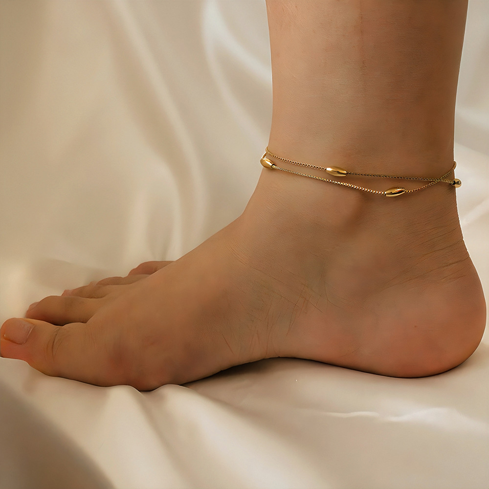 Pie simple de doble capa que no se desvanece, anillo de pie de sentido avanzado para mujer, diseño de nicho de acero inoxidable, cadena de pie de todo fósforo 18K