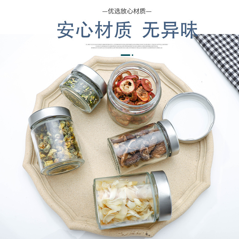 Fabricantes al por mayor botella de miel de tapa alta botella de vidrio de encurtidos redondos olla de almacenamiento de encurtidos de cocina botella de salsa de carne de res con salsa de chile