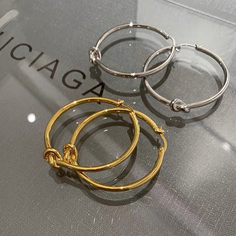 European and American silver knotted big round plain hoop earrings women's exaggerated temperament ear ring niche design high-grade feeling gold earrings new