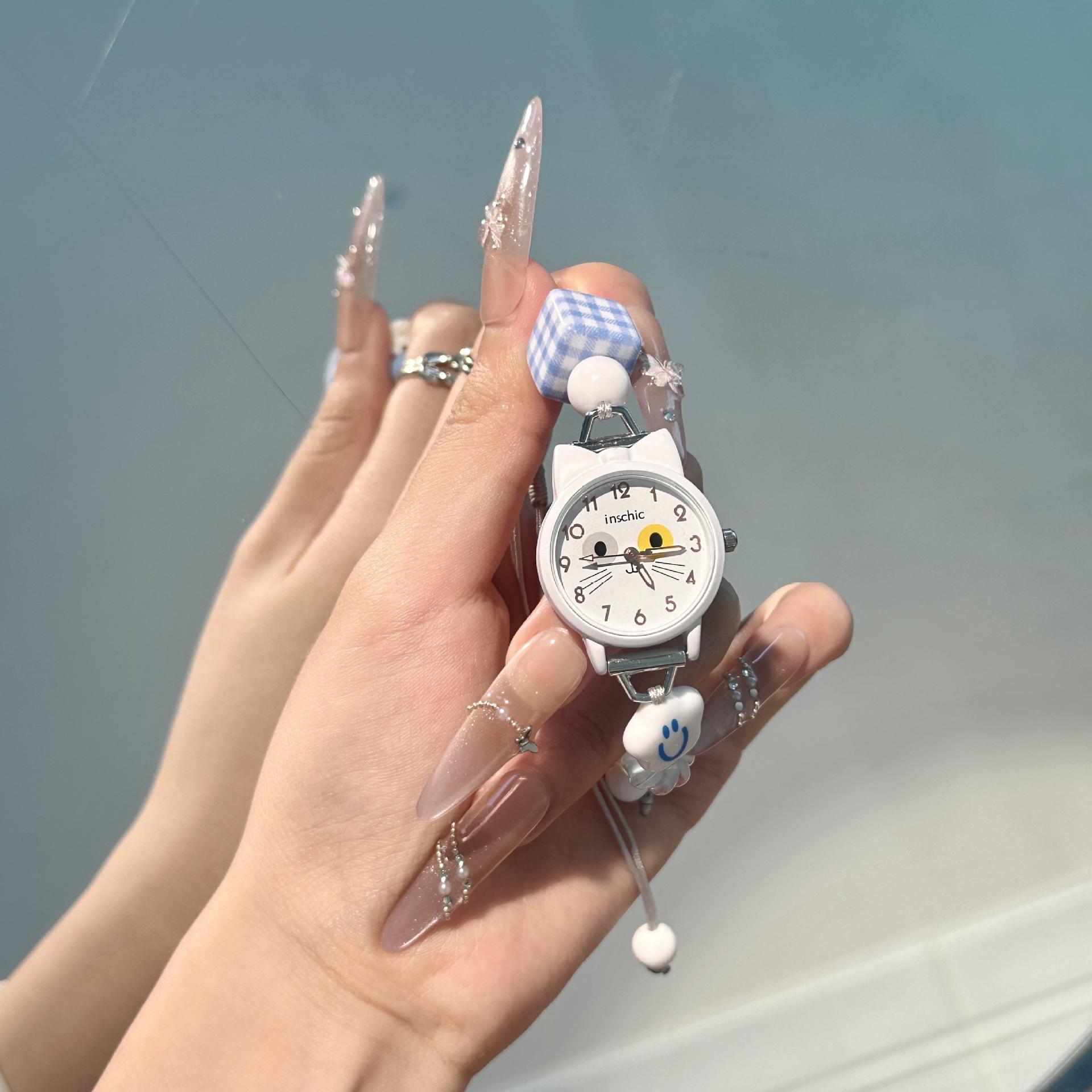 Reloj con cuerda trenzada de gato S1562B