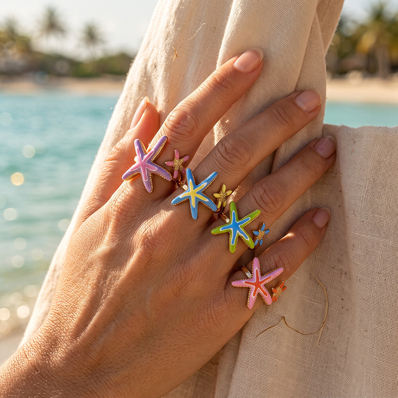 Tina Europa y América acero inoxidable transfronterizo pintado esmalte de goteo de aceite mar de vacaciones en la playa del mar estrella de mar anillo abierto para mujeres