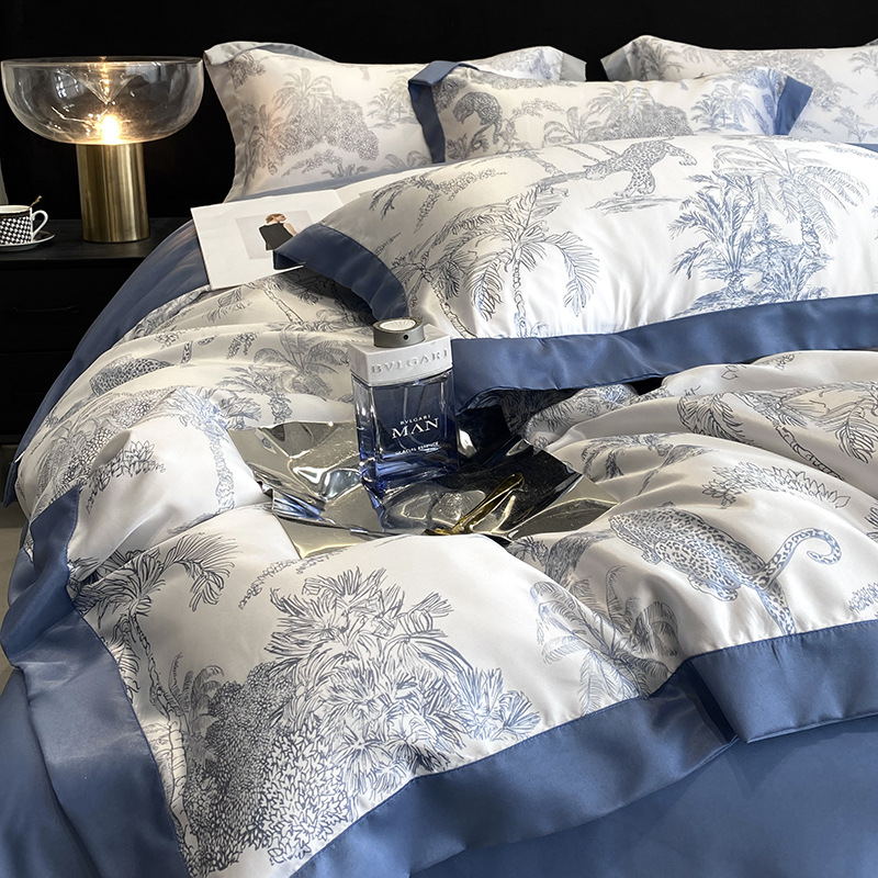 Cama de seda de hielo de verano de cuatro piezas de lujo ligero de alta gama 2025 nueva funda de edredón de sábana de tres piezas ropa de cama de seda lavada