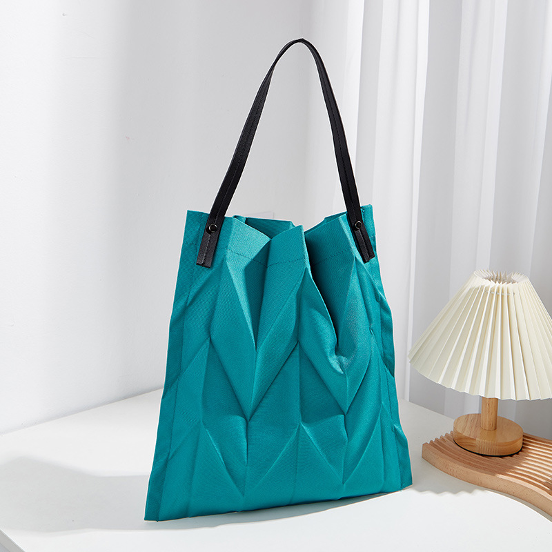 Γυναικεία τσάντα ώμου υψηλών προδιαγραφών 2023 New Light Luxury Canvas Τσάντα μεγάλης χωρητικότητας διπλωμένη τσάντα Messenger_voghion.com