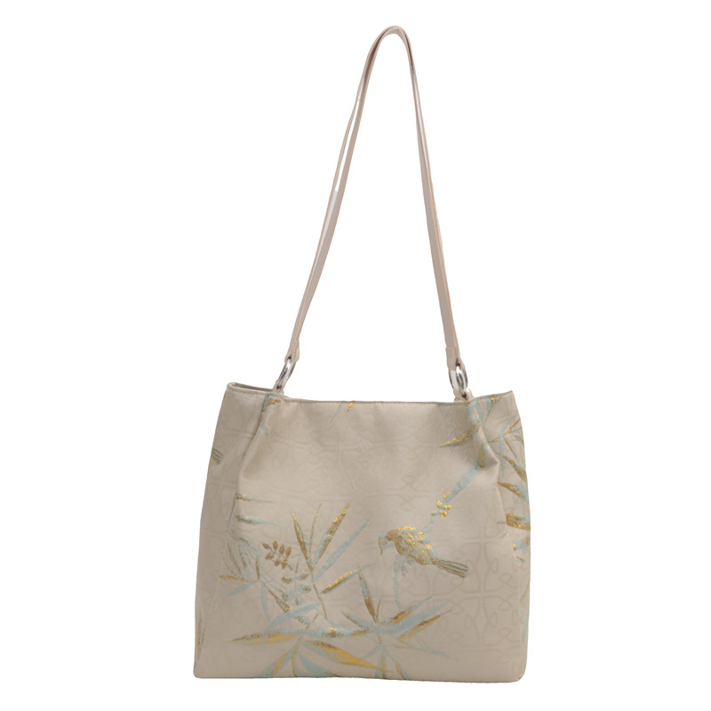 Nueva bolsa de gran capacidad de estilo chino para mujeres 2024 nueva moda bordada bolsa de hombro para trabajar bolsa de viaje moda