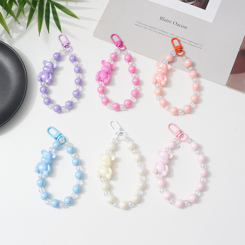 Fabricante al por mayor nuevo color acrílico osos móviles colgante de cuentas llavero pequeño colgante accesorios de bolsos
