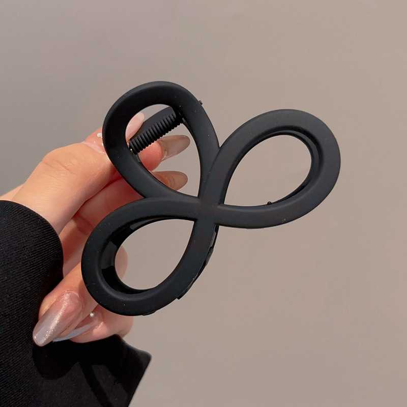 4 clip de agarre negro de ocho caracteres