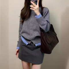 グレーの柔らかいモチモチのニットの女性の春と秋の高級感の気質のカジュアルなコンビネーションのボタンのカーディガンのコート